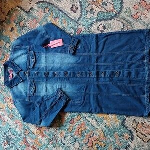 Brand new, never worn long Jean jacket!! Beautiful denim color, still with tags